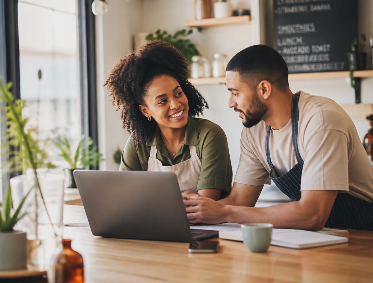 A small business owner reviewing their new website